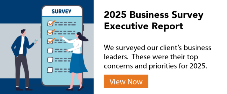 image of two people filing out a survey on a large smartphone - click to view our 2025 business survey results